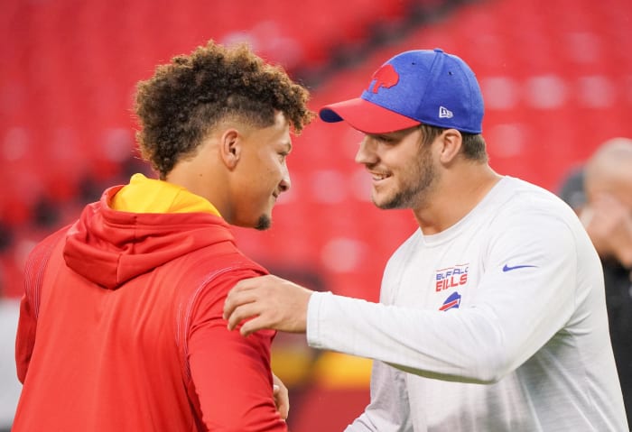 Oct 10, 2021; Kansas City, Missouri, USA; Kansas City Chiefs quarterback Patrick Mahomes (15) talks with Buffalo Bills quarterback Josh Allen (17) before warm ups at GEHA Field at Arrowhead Stadium. Mandatory Credit: Denny Medley-USA TODAY Sports